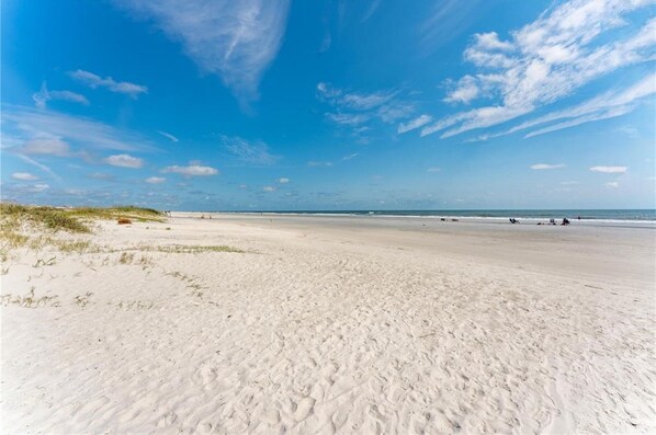 On the beach, sun loungers, beach towels