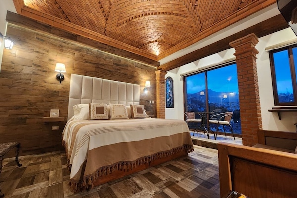 Deluxe Room, 1 King Bed, Balcony, Mountain View | 1 bedroom, premium bedding, down comforters, in-room safe