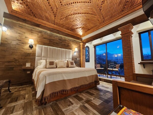 Deluxe Room, 1 King Bed, Balcony, Mountain View | 1 bedroom, premium bedding, down comforters, in-room safe