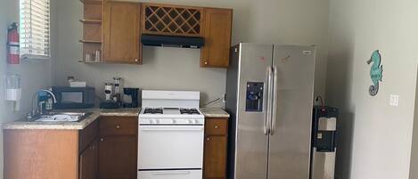 Fridge, microwave, coffee/tea maker, toaster