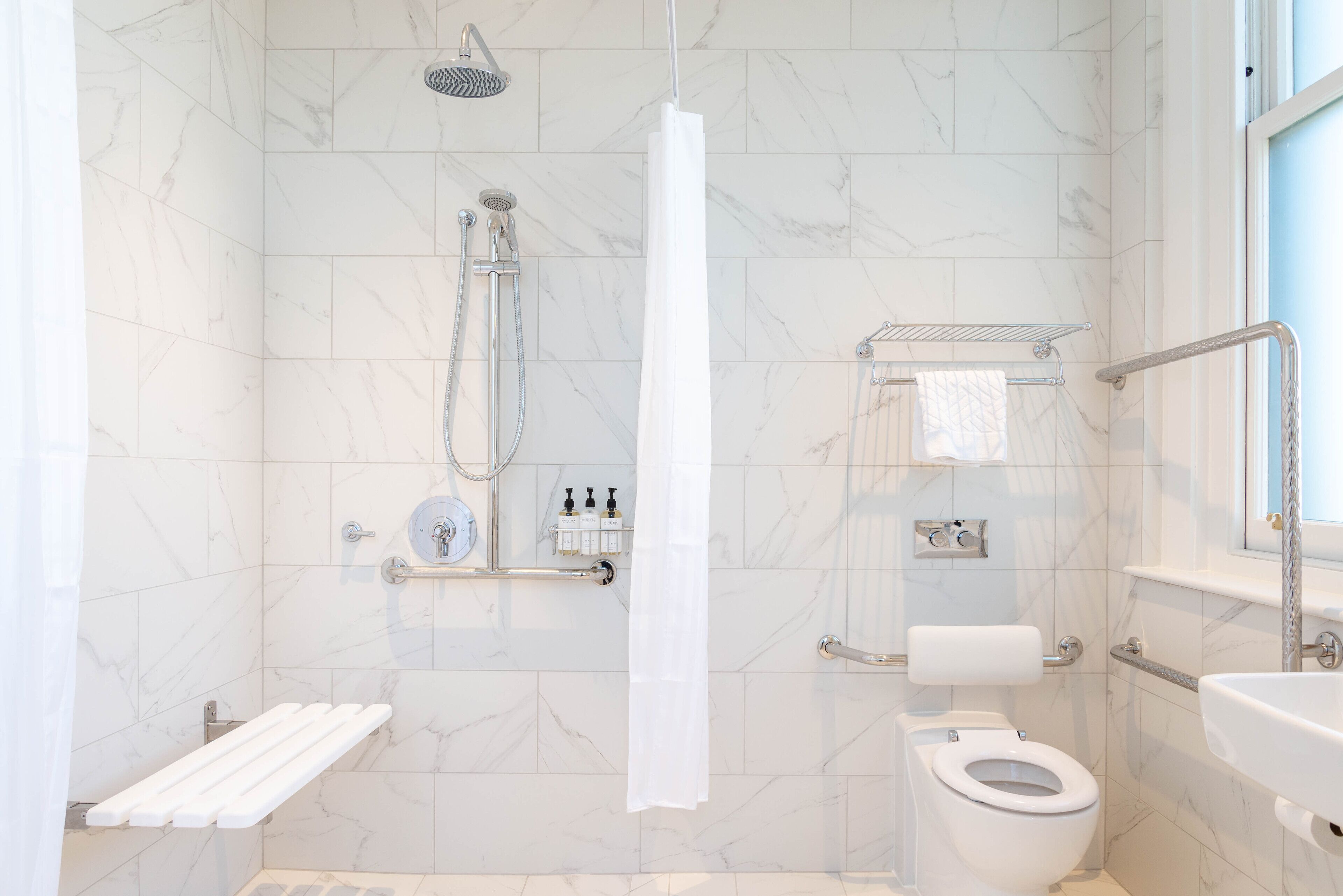observatory deluxe room | bathroom | shower, rainfall showerhead, free toiletries, hair dryer