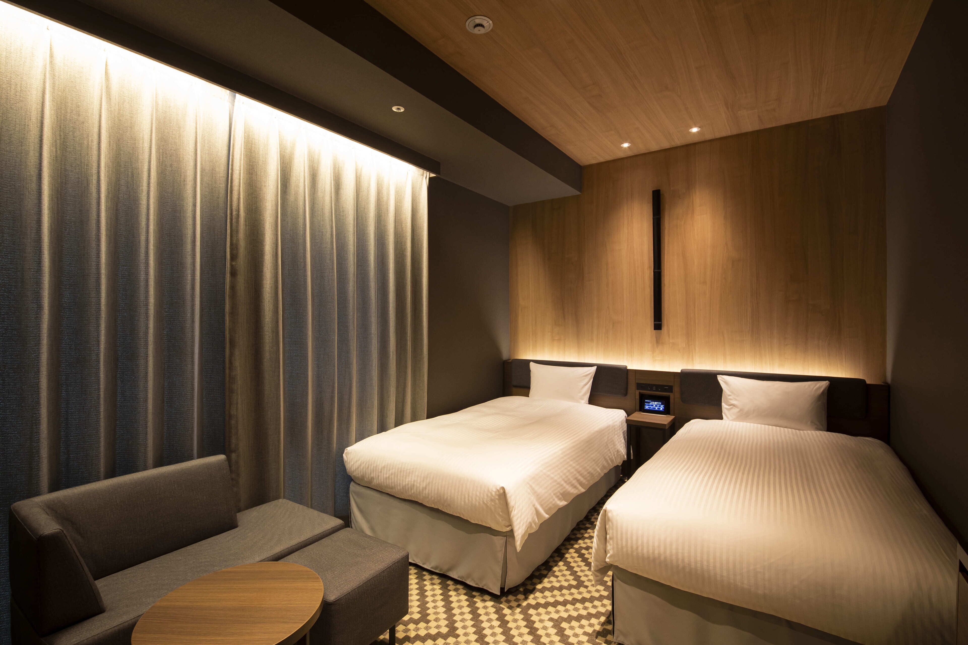 superior twin room, non smoking | 1 bedroom, down duvets, in-room safe, desk