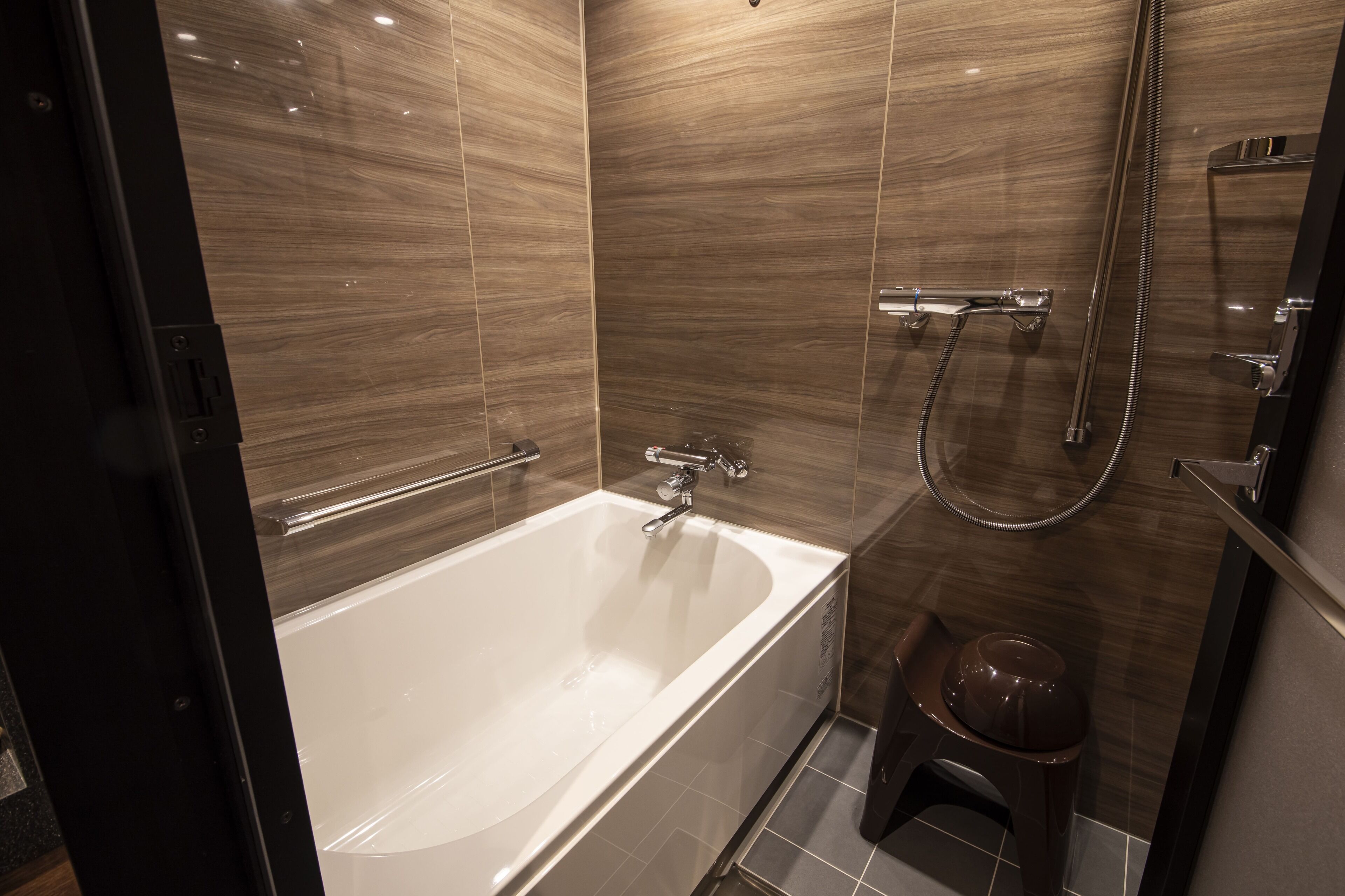 hair dryer, slippers, electronic bidet, towels