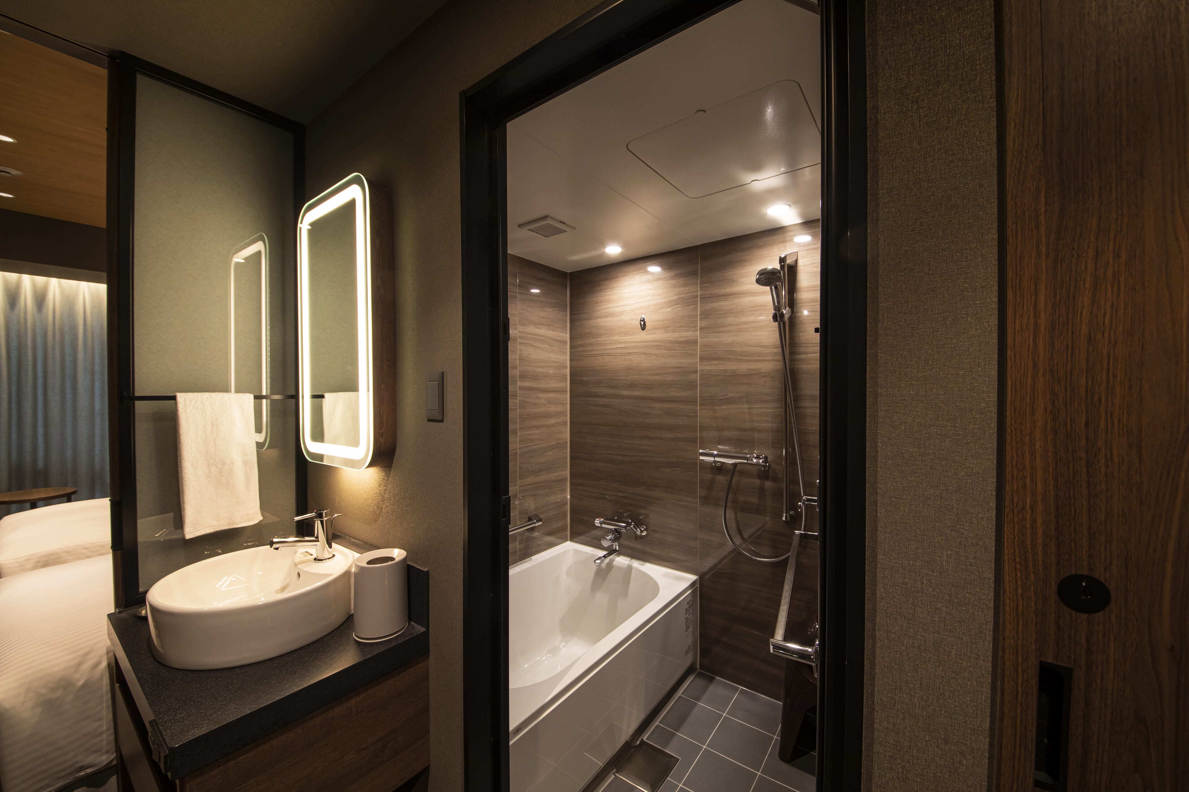 hair dryer, slippers, electronic bidet, towels