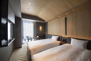 Habitación con 2 camas individuales, para no fumadores | Edredón, caja de seguridad en la habitación y escritorio 