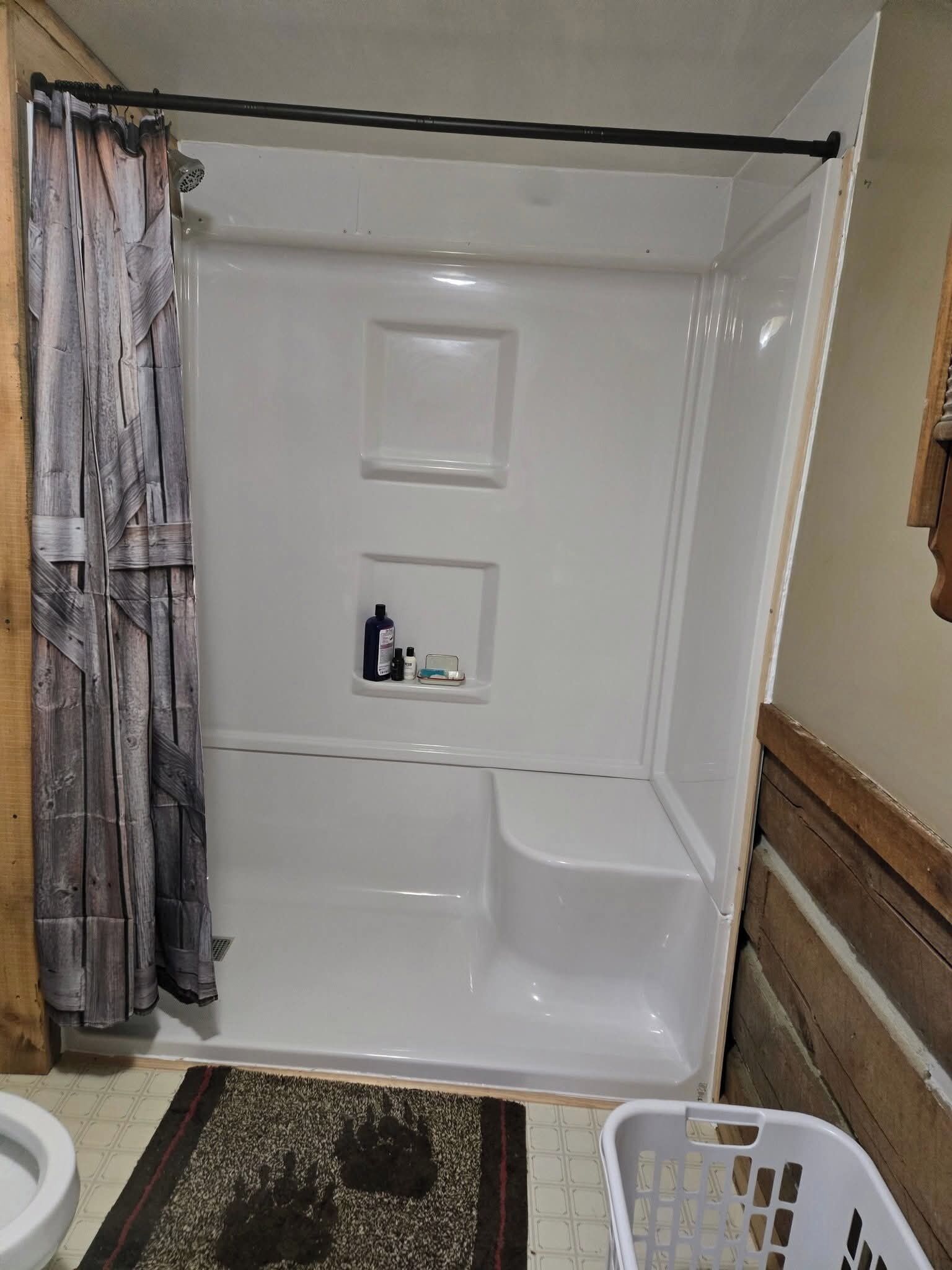 Bathtub, hair dryer, towels, soap