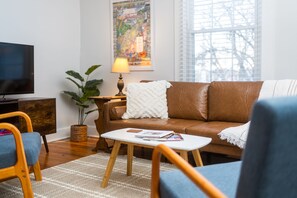 Smart TV, fireplace, books