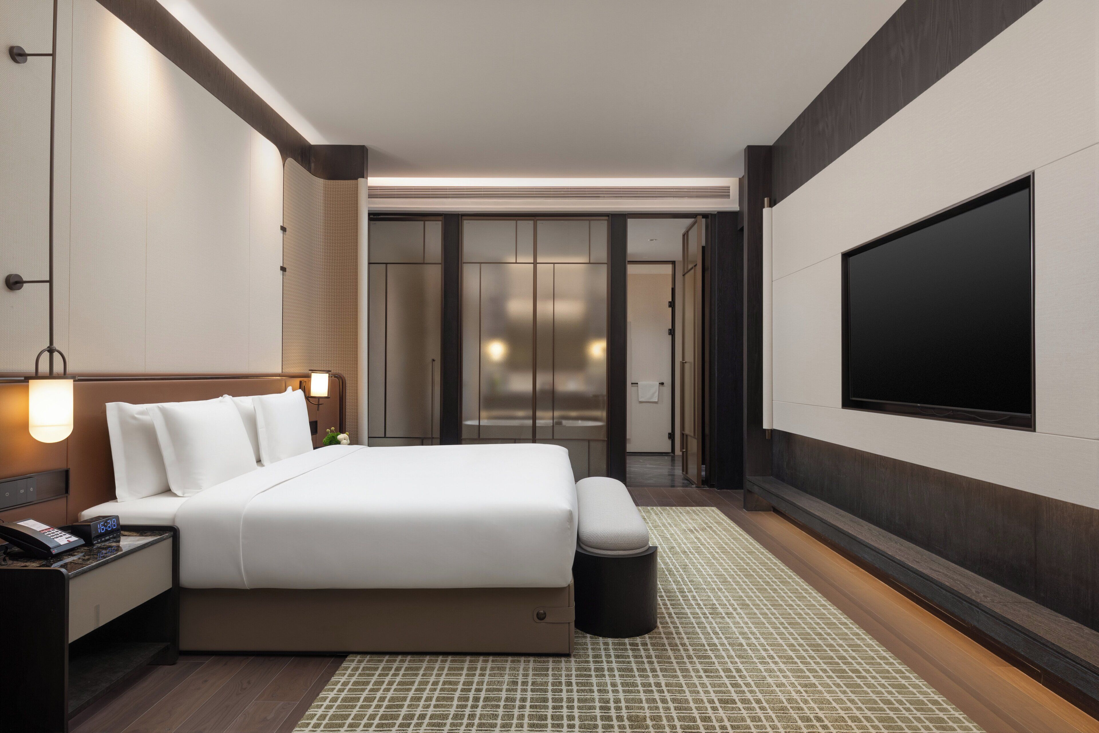 Premium bedding, down comforters, memory foam beds, free minibar items