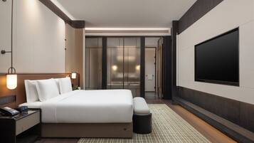 Premium bedding, down comforters, memory foam beds, free minibar items