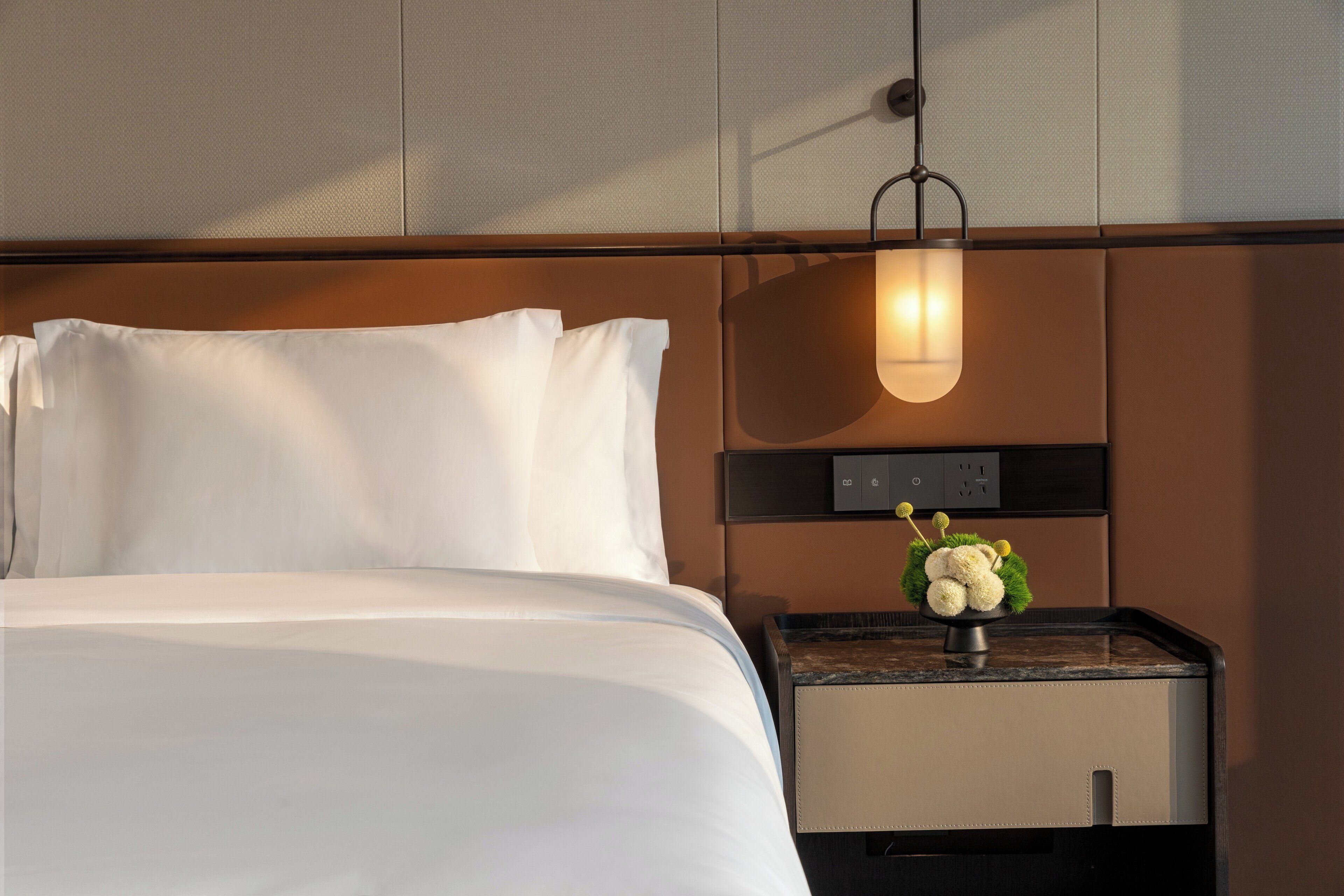 Premium bedding, down duvets, memory-foam beds, free minibar items