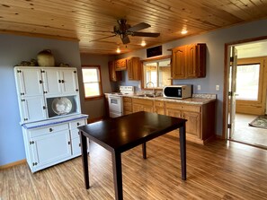 Fridge, microwave, cookware/dishes/utensils