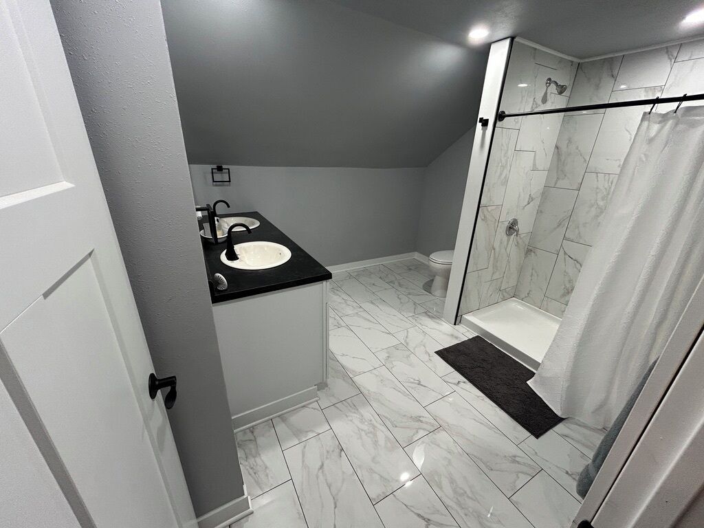 Hair dryer, towels, soap, toilet paper