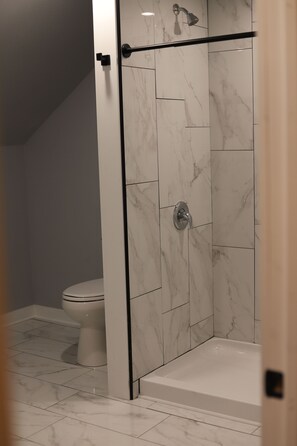 Hair dryer, towels, soap, toilet paper