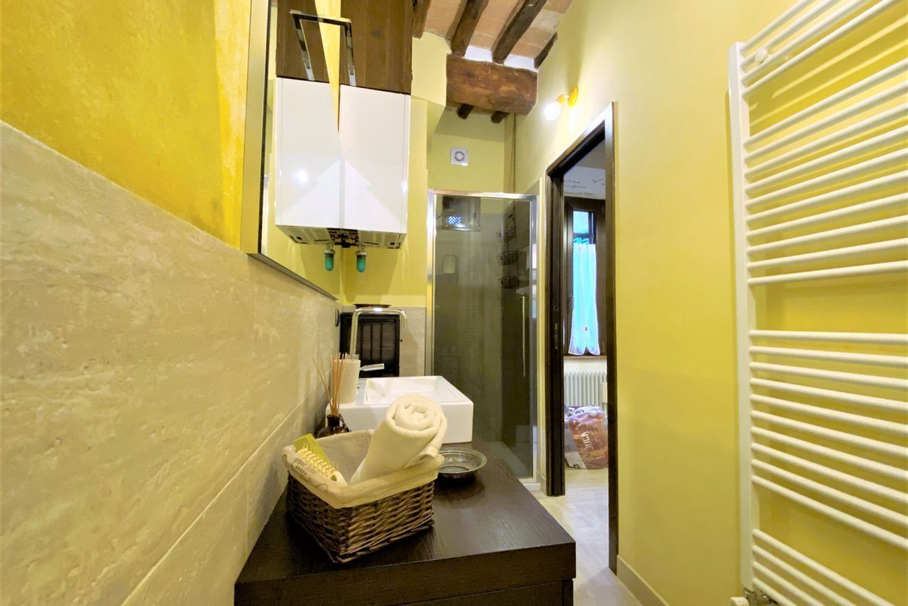 Ducha, secador de pelo, bidet, toallas
