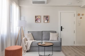 Apartment, 1 Bedroom, Terrace | Living room | Flat-screen TV