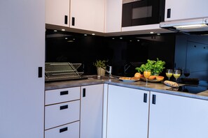 Mini-fridge, microwave, oven, electric kettle