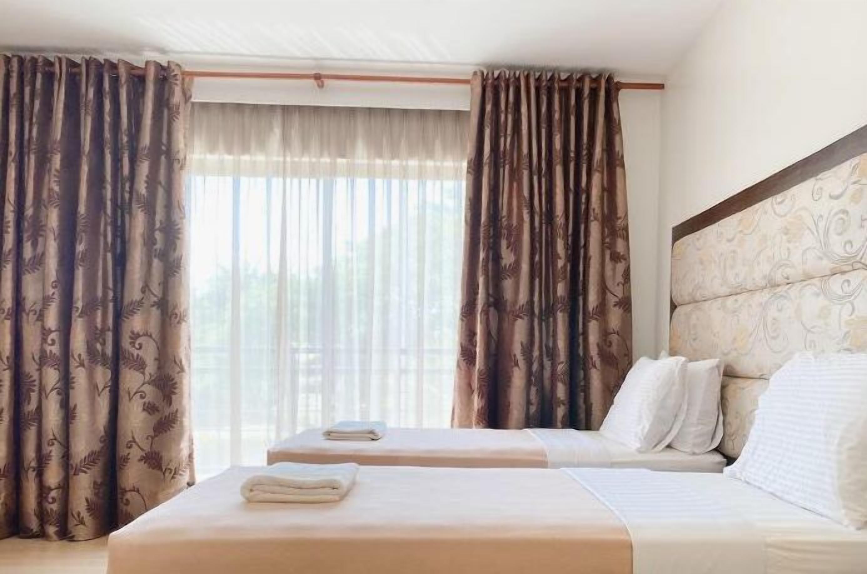 standard twin room | laptop workspace, blackout curtains, free wifi, bed sheets