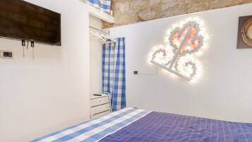 1 slaapkamer, een strijkplank/strijkijzer, wifi, beddengoed