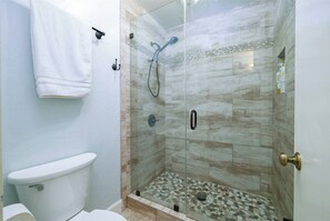 Hair dryer, towels, soap, shampoo
