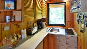 Fridge, stovetop, coffee/tea maker, electric kettle