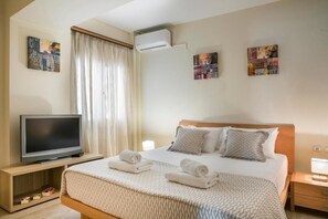 2 dormitorios, tabla de planchar con plancha, wifi y ropa de cama