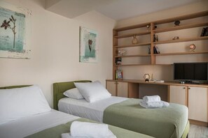 2 dormitorios, tabla de planchar con plancha, wifi y ropa de cama