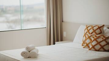Deluxe Double Room | Minibar, desk, laptop workspace, blackout curtains