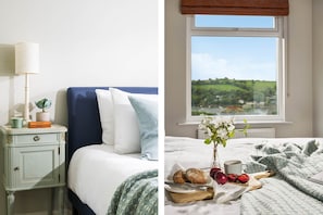 Relax in comfort with a bed and a view of the surrounding landscape.