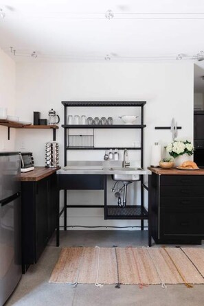 Fridge, microwave, stovetop, coffee/tea maker