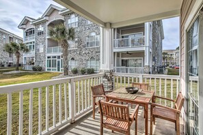 Enjoy al fresco dining and socializing in this inviting outdoor space.
