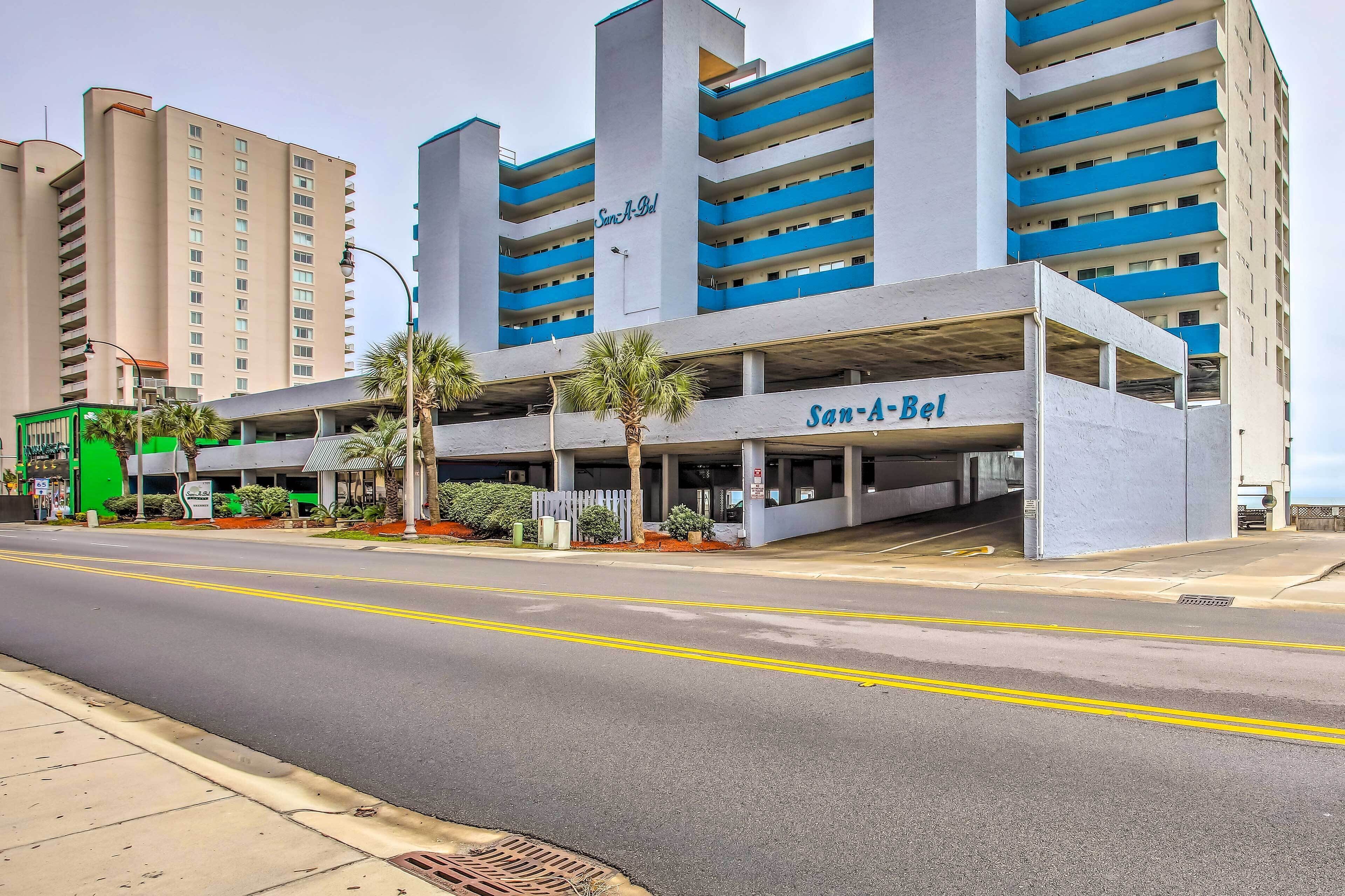 A multi-story parking garage with the name "San-A-Bel" on the facade.
