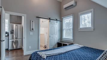 1 bedroom, desk, iron/ironing board, travel crib