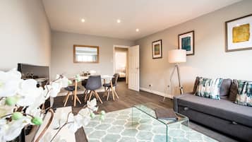 Superior Apartment | Living area | 43-inch TV with digital channels, Netflix, streaming services