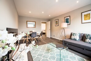 Superior Apartment | Living area | 43-inch TV with digital channels, Netflix, streaming services