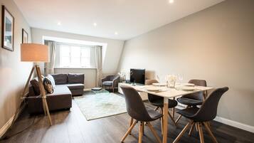 Superior Apartment | Living area | 43-inch TV with digital channels, Netflix, streaming services