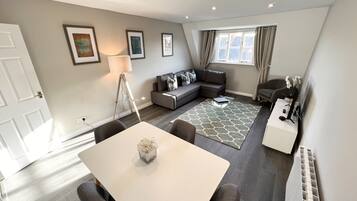 Superior Apartment | Living area | 43-inch TV with digital channels, Netflix, streaming services