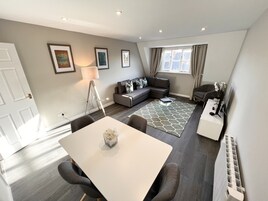 Superior Apartment | Living area | 43-inch TV with digital channels, Netflix, streaming services