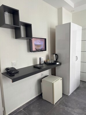 Standard Triple Room (without balcony) | Minibar, in-room safe, blackout curtains, iron/ironing board