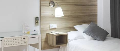 Desk, free WiFi, bed sheets