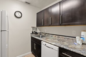 Fridge, microwave, oven, stovetop - 🌴 Surf Song #237 — King Bed Comfort with Gulf Breezes & Walkable Charm (Madeira Beach)