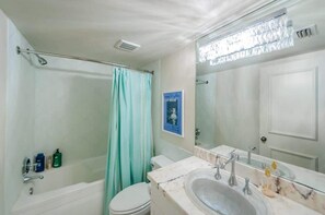 Combined shower/tub, hair dryer, towels, shampoo