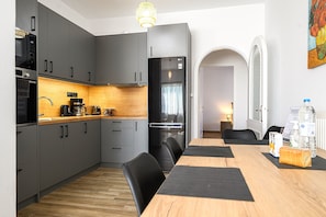 No. 1 - 2 Bedroom Apartment | Private kitchen | Full-size fridge, microwave, oven, coffee/tea maker