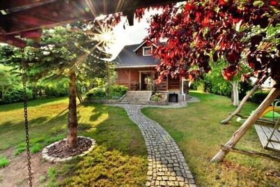 Holiday home by the lake, private garden, Oswino