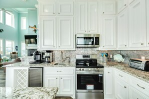 Fridge, microwave, oven, stovetop - Private Beachfront Home w/ Screened Deck, Equipped Kitchen, Quick Beach Access (Galveston)
