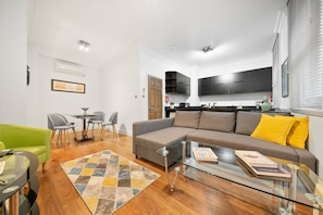 Apartamento de diseño | Zona de estar | Una televisión LCD