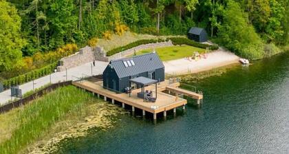 Maison de vacances avec lac et plage privés