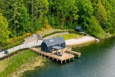 Holiday home with private lake and beach