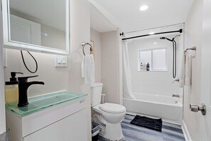 Hair dryer, towels, soap, shampoo