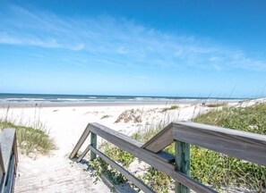 On the beach, sun loungers, beach towels