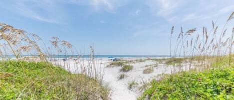 On the beach, sun-loungers, beach towels